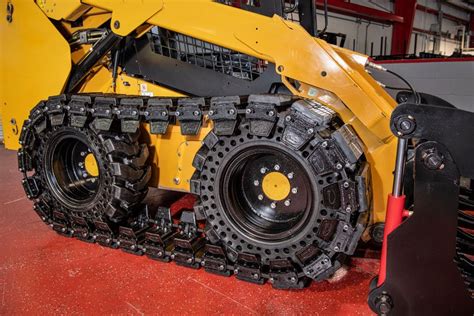 putting tracks on a wheeled skid steer|skid steer add on tracks.